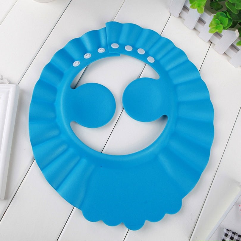 Visière chapeau pour douche bébé I ShampooCap™ - DouxBébé City