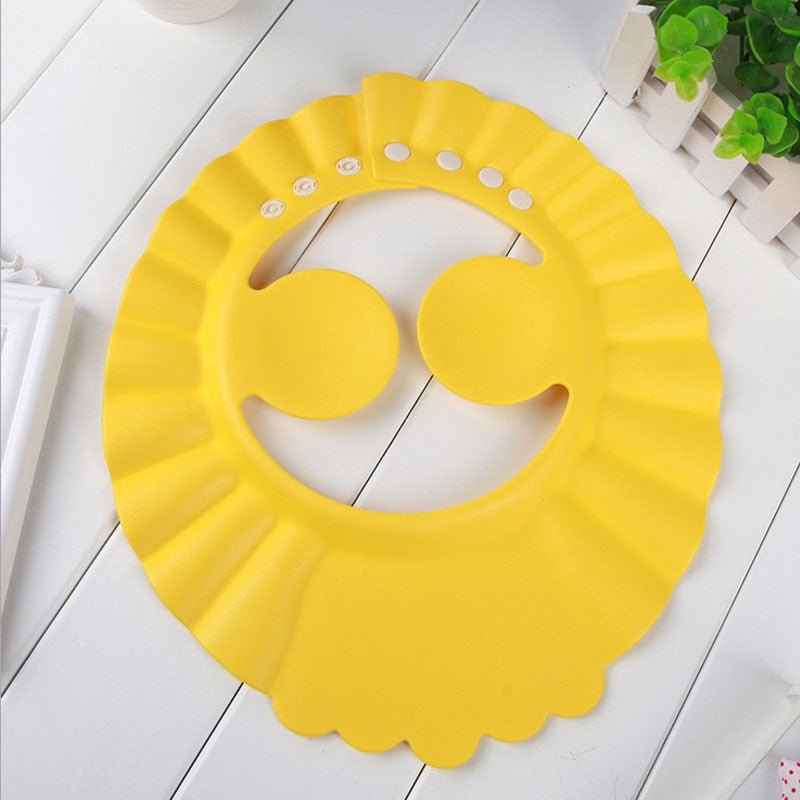 Visière chapeau pour douche bébé I ShampooCap™ - DouxBébé City